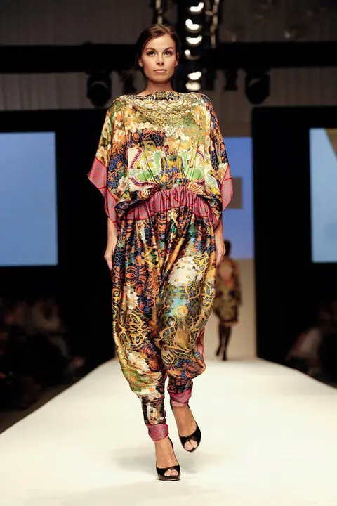 Arabian Nomads : Exclusive Arab Dress Collection at DFW, SS11 9 Silk satin jumpsuit with jodhpuri-style trousers and a pixelated Simurgh stained glass print, inspired by the Nadir Divan-Beghi portal in Bukhara, with Swarovski crystal neckline.